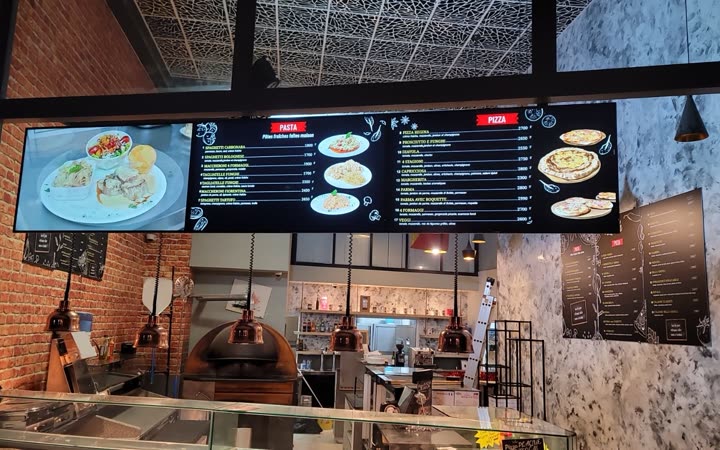 Digital menu board at Bella Napoli